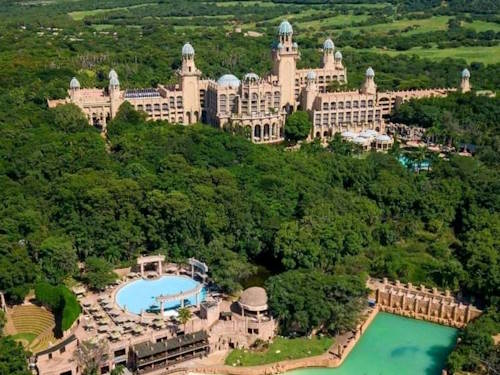 Aerial view of Sun City Resort in South Africa with lush greenery and pools